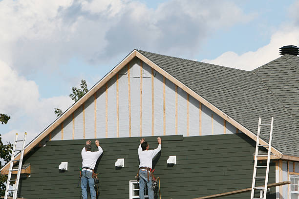Professional Siding technician working in Jonesboro, GA